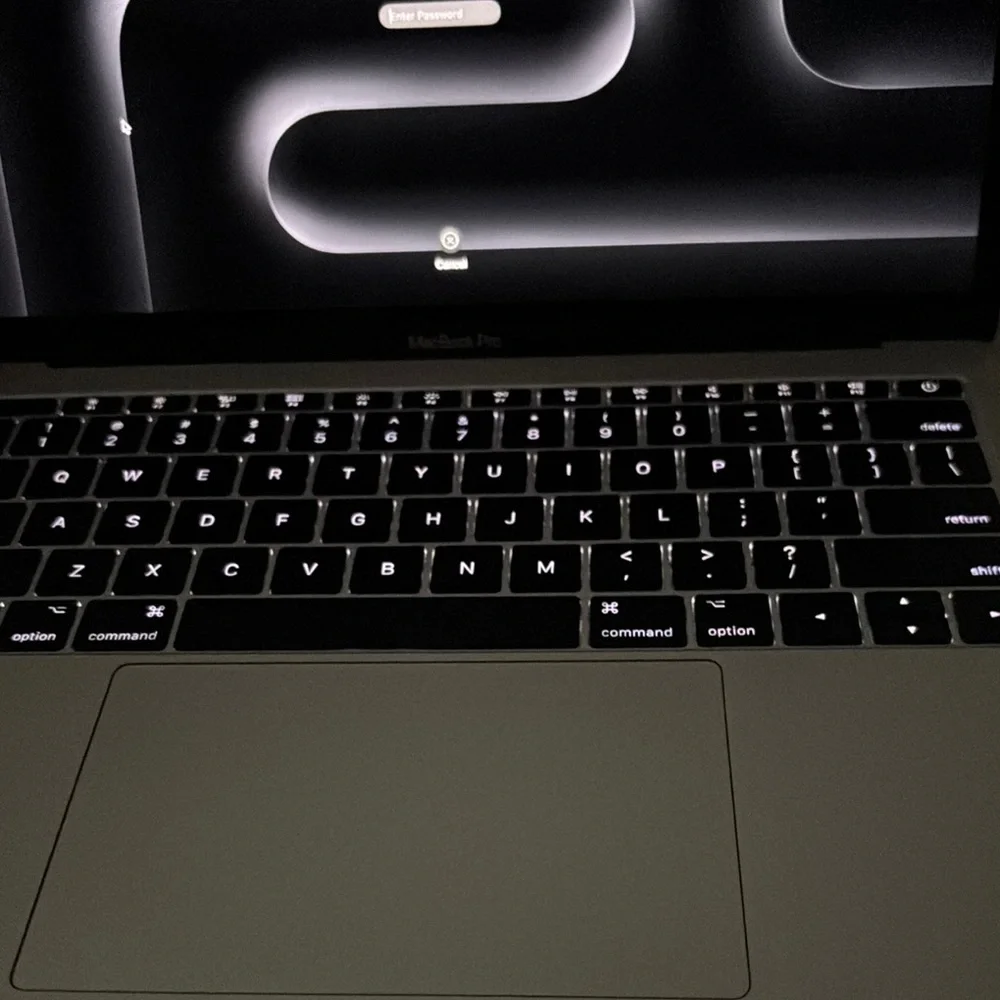 Apple Silver MacBook Pro with Backlit Keyboard and Touchpad